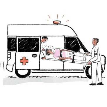 To ambulansepersonell som frakter en mann på båre inn i en ambulanse.