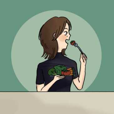A woman eating vegetables.